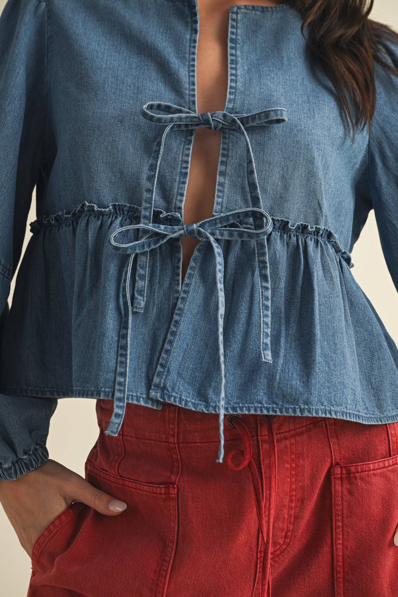 RUFFLE HEM TIE CLOSURE DENIM TOP