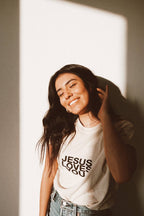 Jesus loves you tee